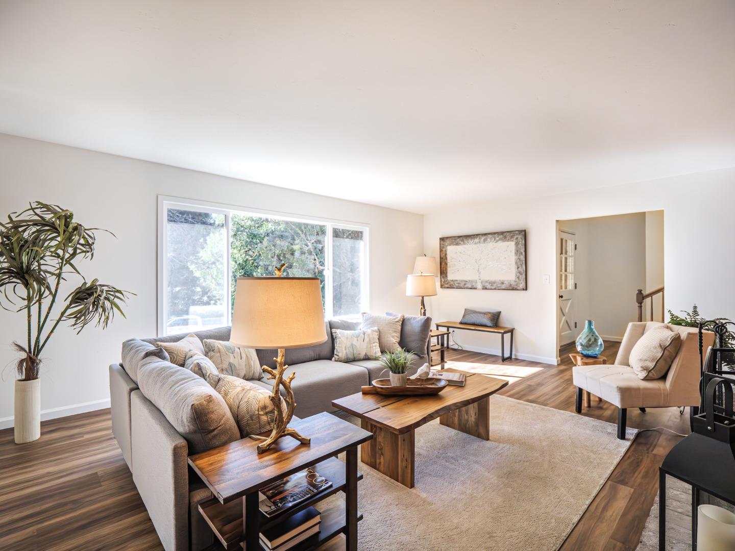 8460 Hihn Road Ben Lomond, CA 95005 - Photo 6 of 50 a living room with furniture and a large window