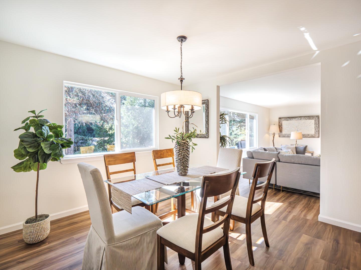 8460 Hihn Road Ben Lomond, CA 95005 - Photo 8 of 50 a dining room with furniture potted plants and wooden floor