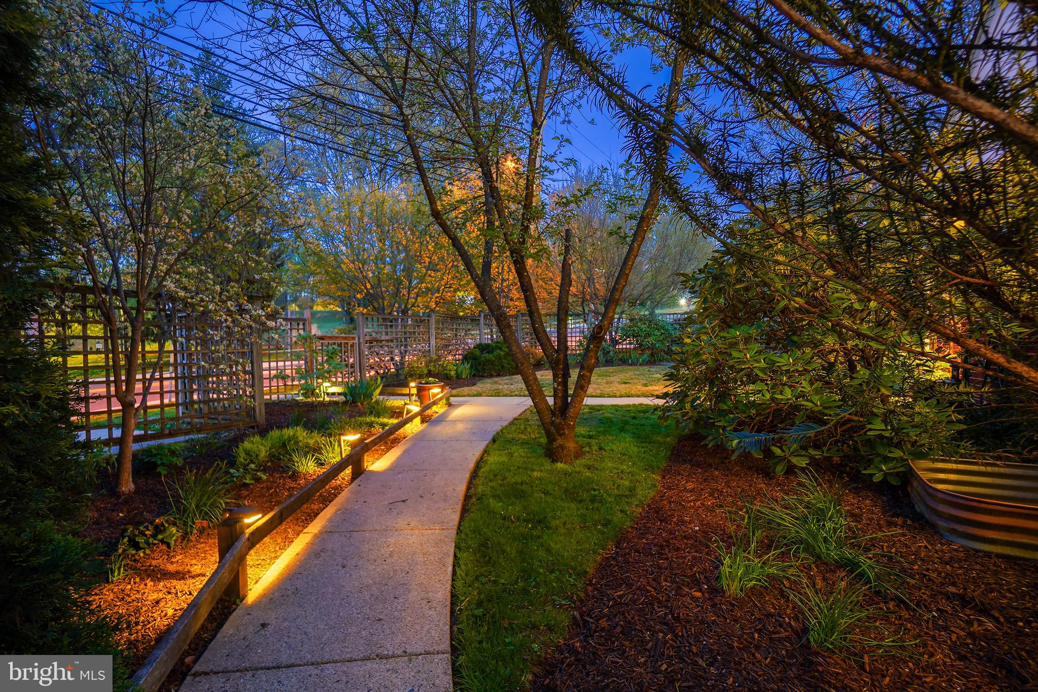8600 Grubb Road Chevy Chase, MD 20815 - Photo 2 of 36 a view of a pathway with a yard