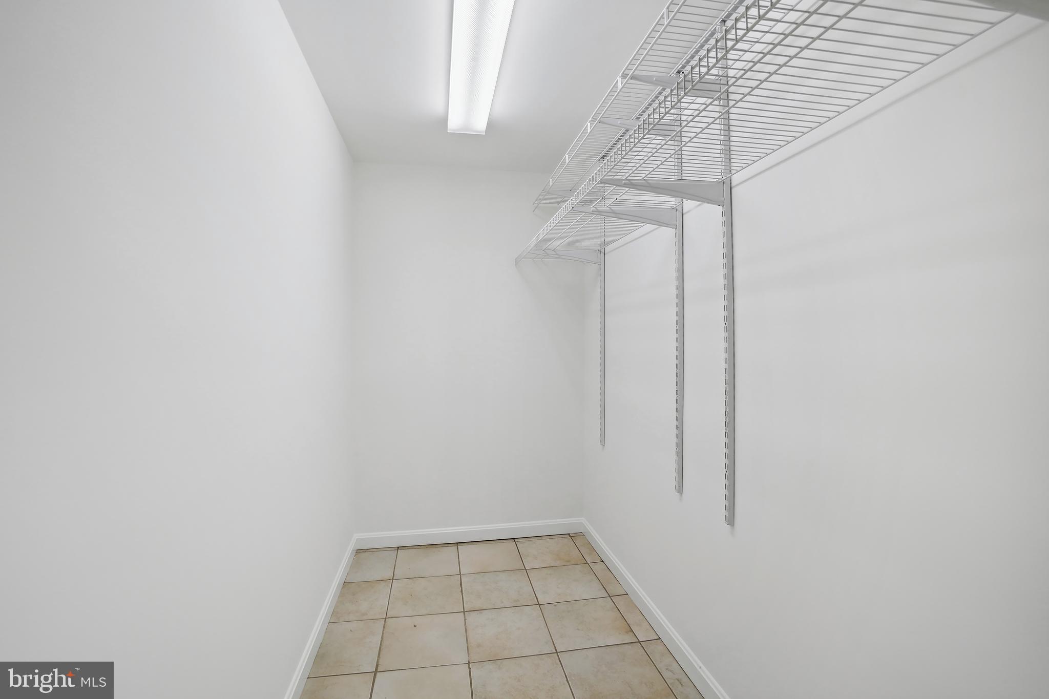 8600 Grubb Road Chevy Chase, MD 20815 - Photo 26 of 36 a view of small space with racks on the wall