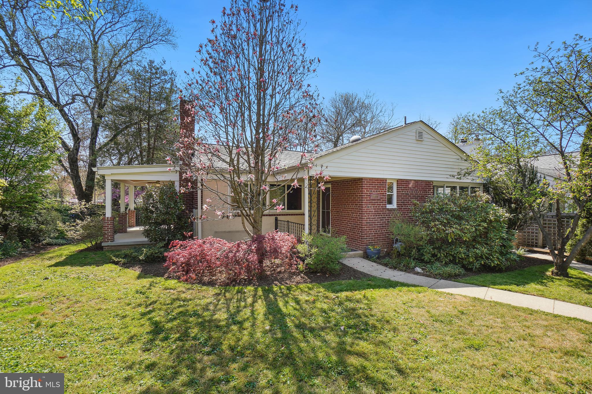 8600 Grubb Road Chevy Chase, MD 20815 - Photo 31 of 36 a front view of a house with garden