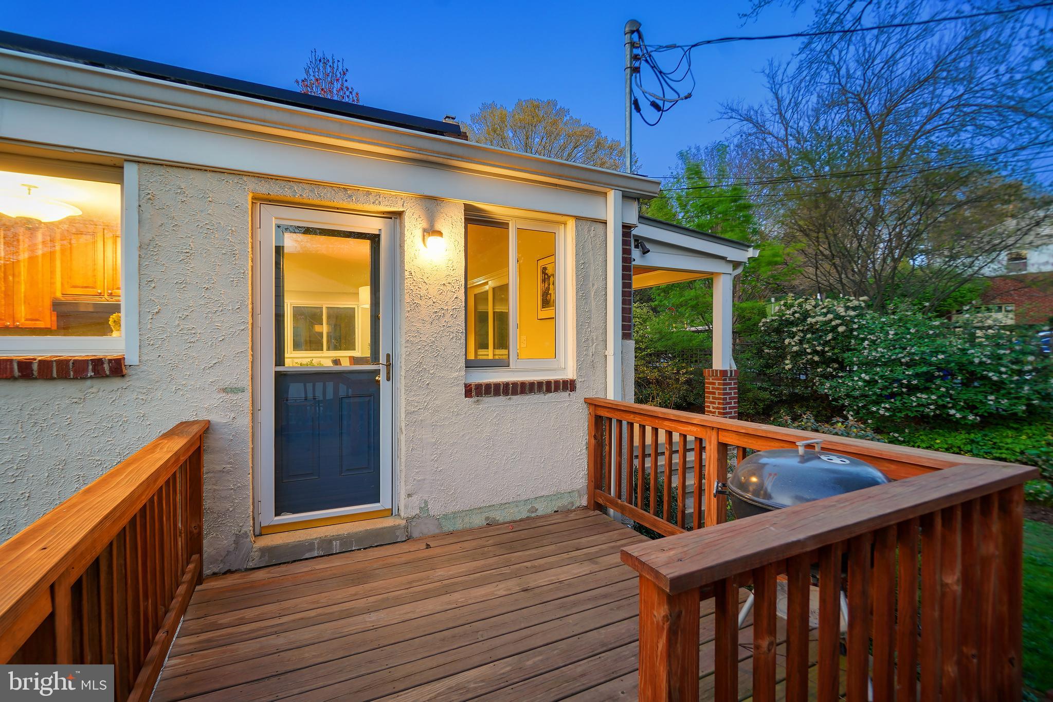 8600 Grubb Road Chevy Chase, MD 20815 - Photo 33 of 36 a view of balcony with wooden floor and outdoor seating