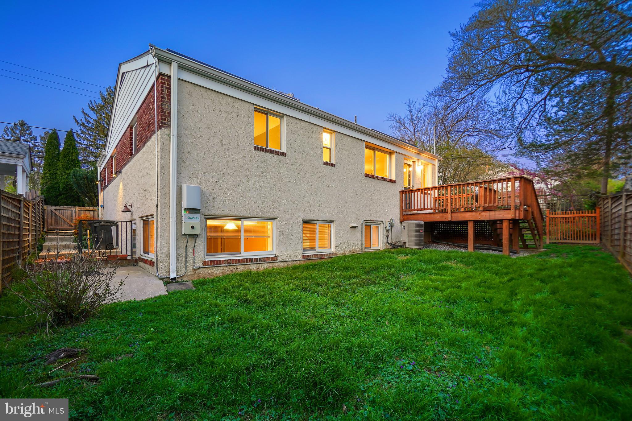 8600 Grubb Road Chevy Chase, MD 20815 - Photo 36 of 36 a front view of house with yard and trees in the background