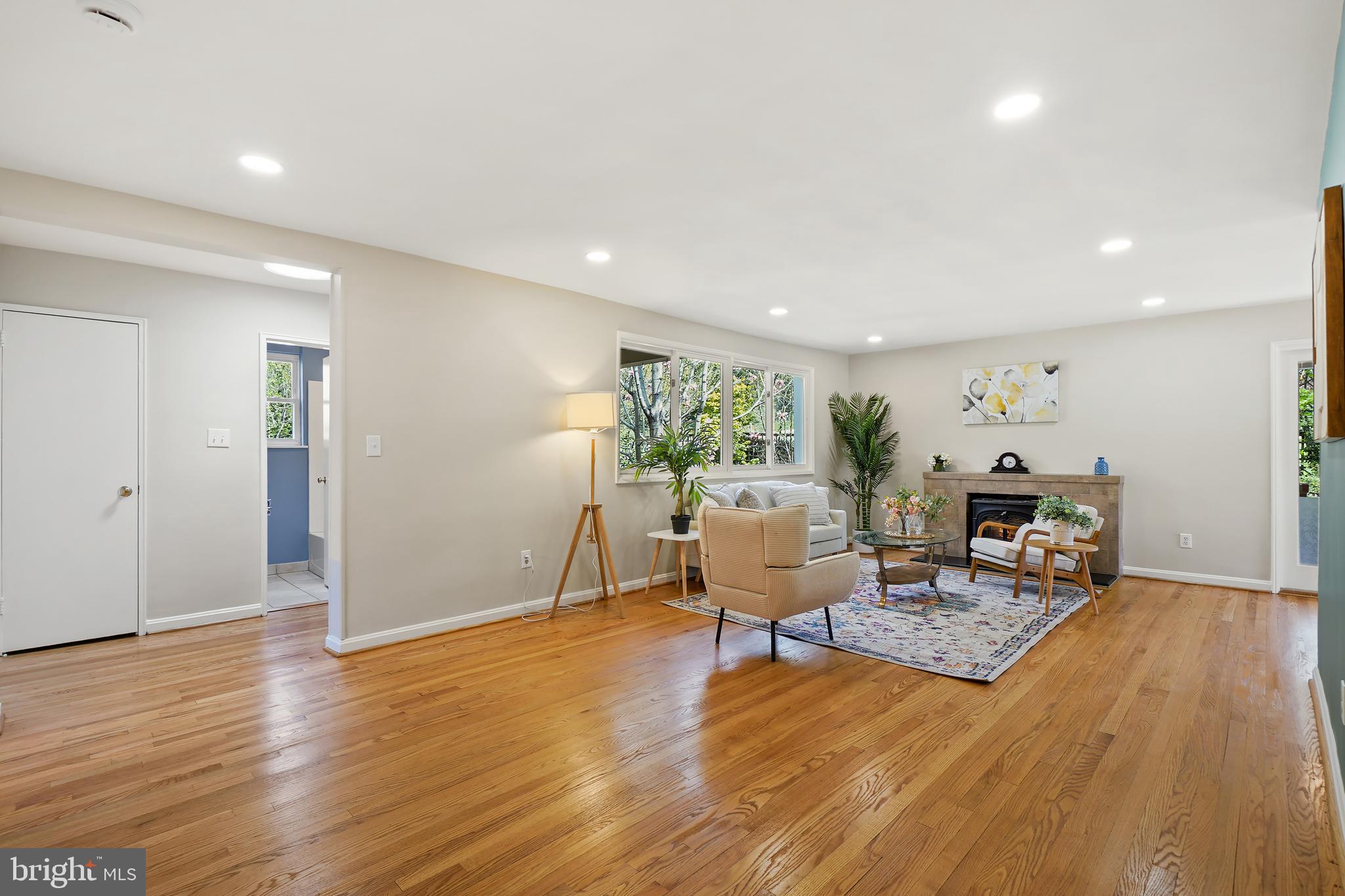 8600 Grubb Road Chevy Chase, MD 20815 - Photo 5 of 36 a living room with furniture and wooden floor