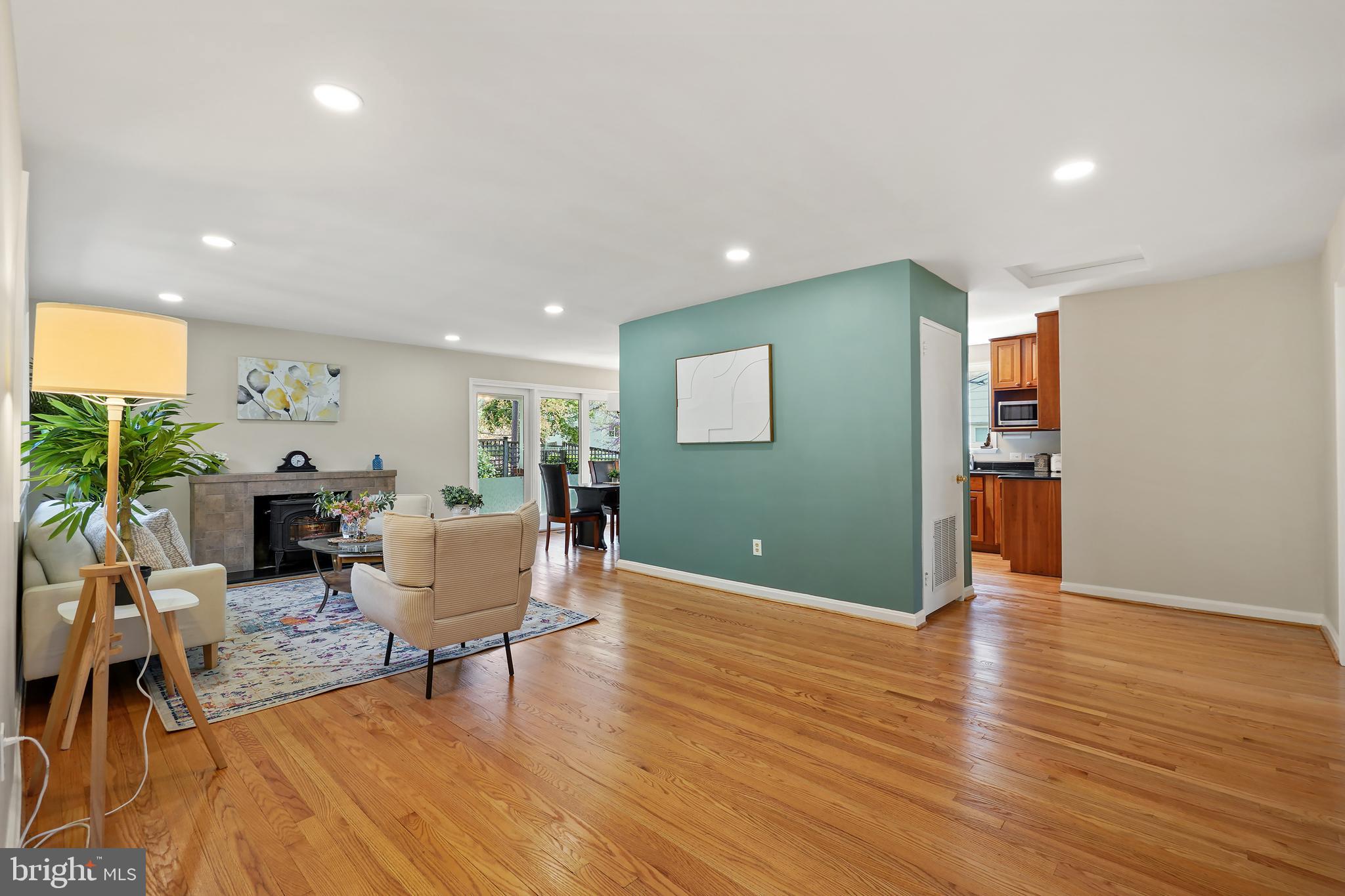 8600 Grubb Road Chevy Chase, MD 20815 - Photo 8 of 36 a living room with furniture and wooden floor