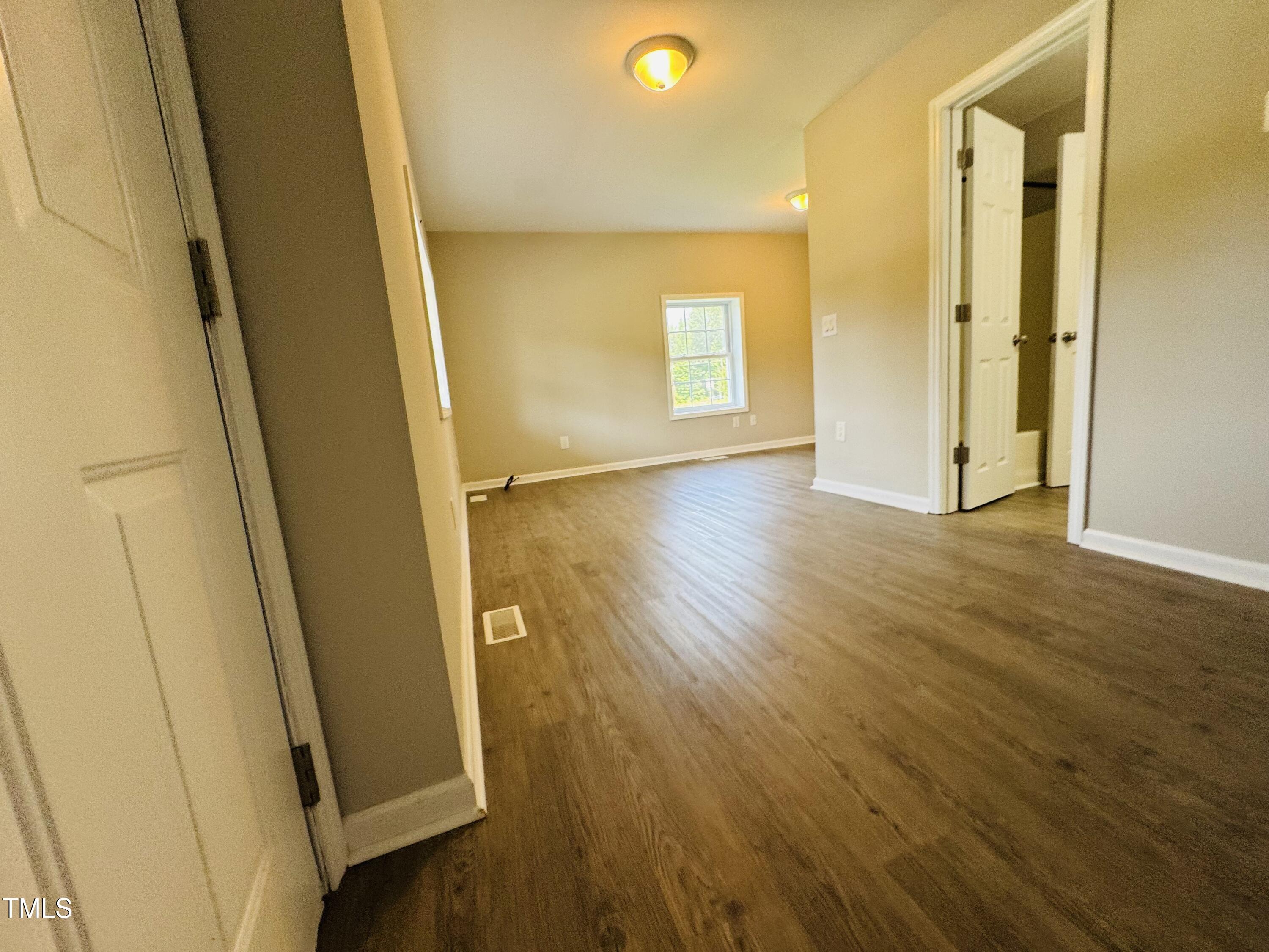 527 Forrest Street Hillsborough, NC 27278 - Photo 10 of 44 wooden floor in an empty room
