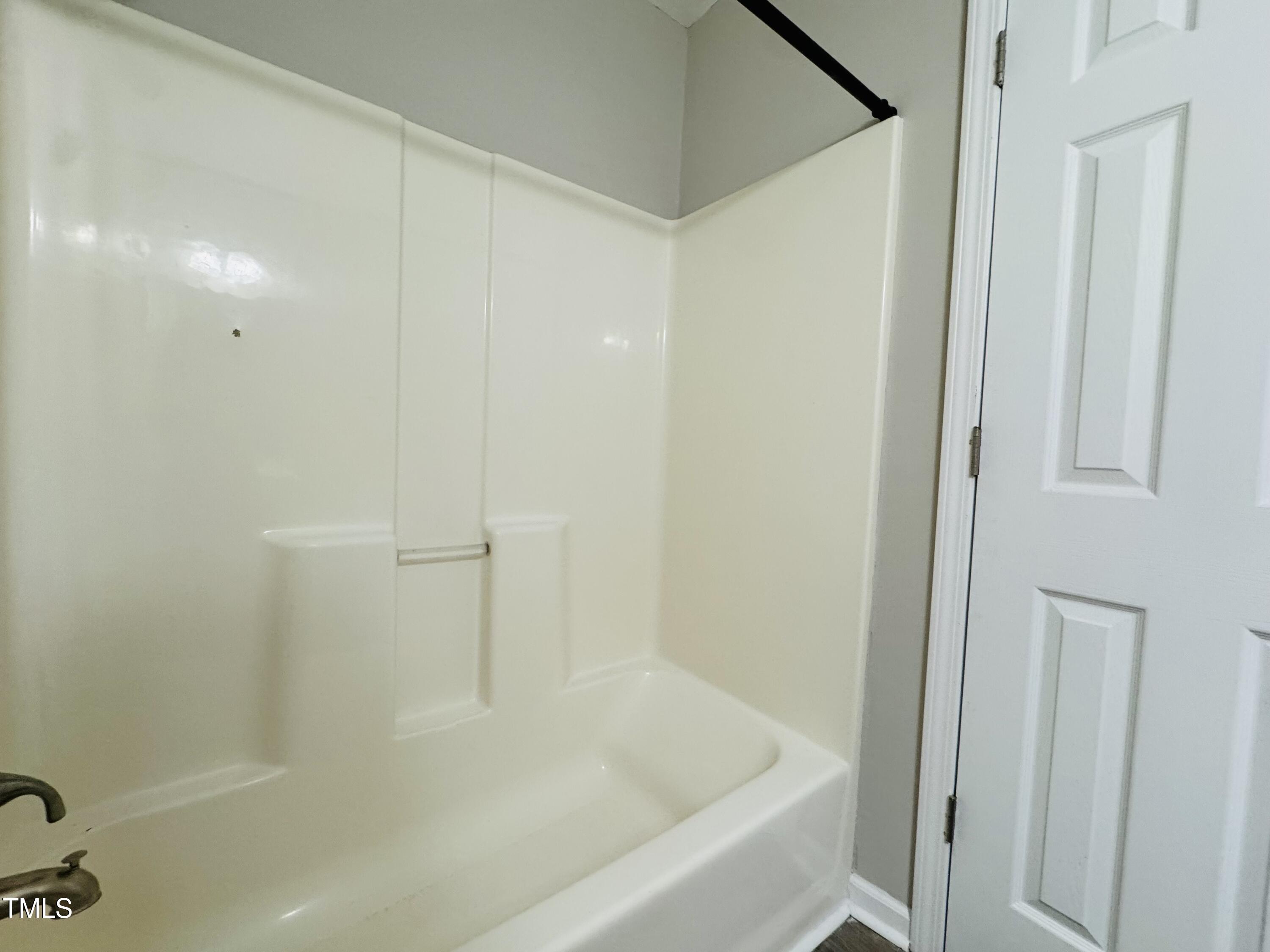 527 Forrest Street Hillsborough, NC 27278 - Photo 32 of 44 a bathroom with a bathtub