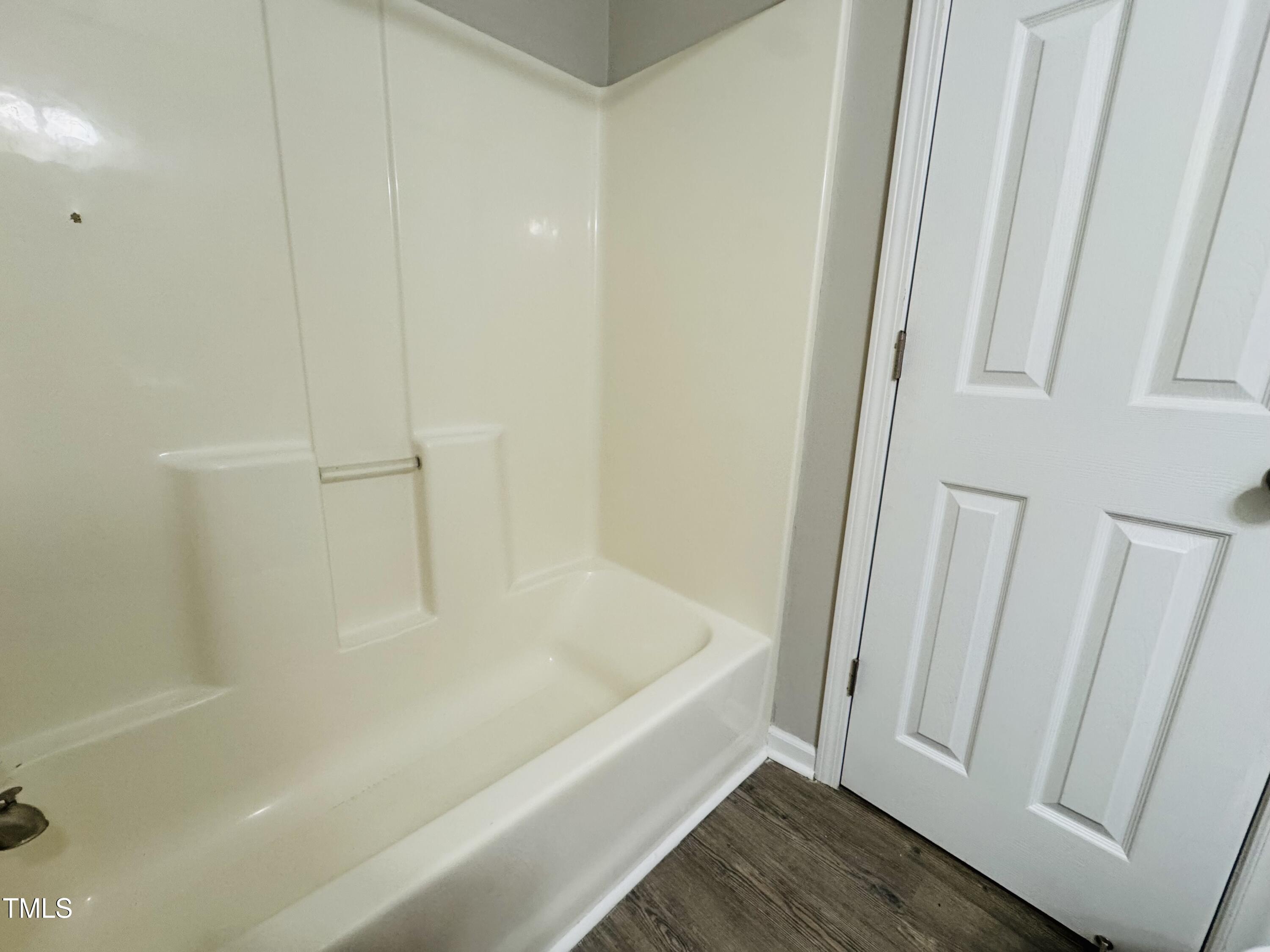 527 Forrest Street Hillsborough, NC 27278 - Photo 33 of 44 a bathroom with a bathtub