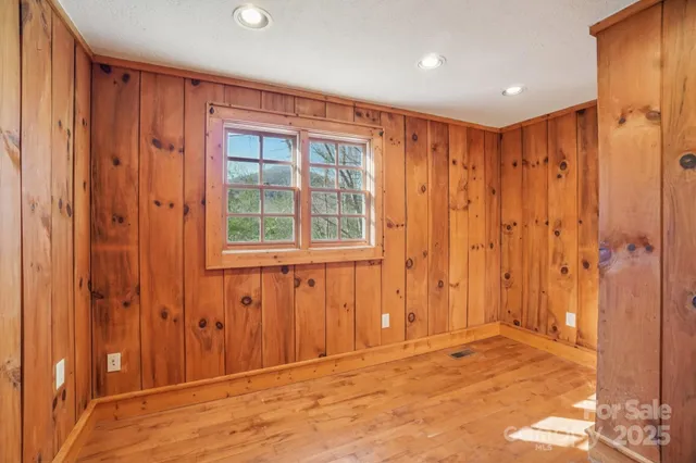 a view of a livingroom with wooden floor