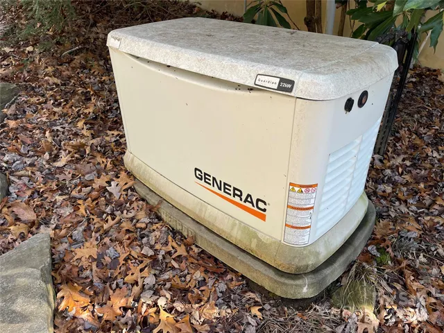 a view of a house with snow on the road