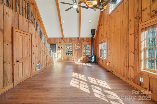 a view of an entryway with wooden floor