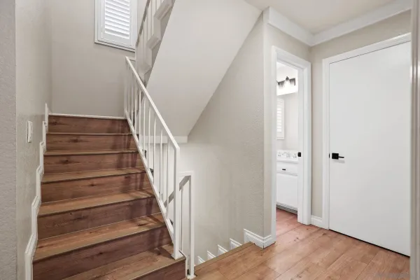 a view of entryway with wooden floor