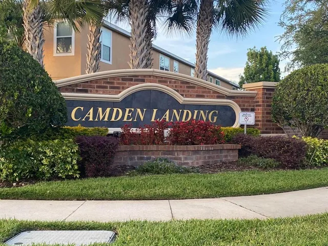 a sign that is on the side of a building