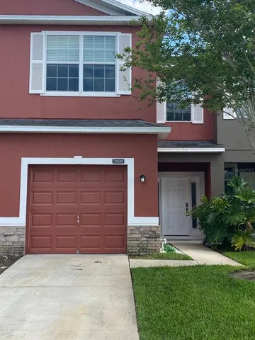 a house view with a outdoor space