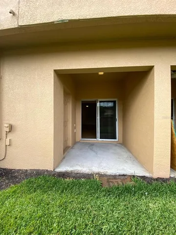 a kitchen with stainless steel appliances a refrigerator and a microwave