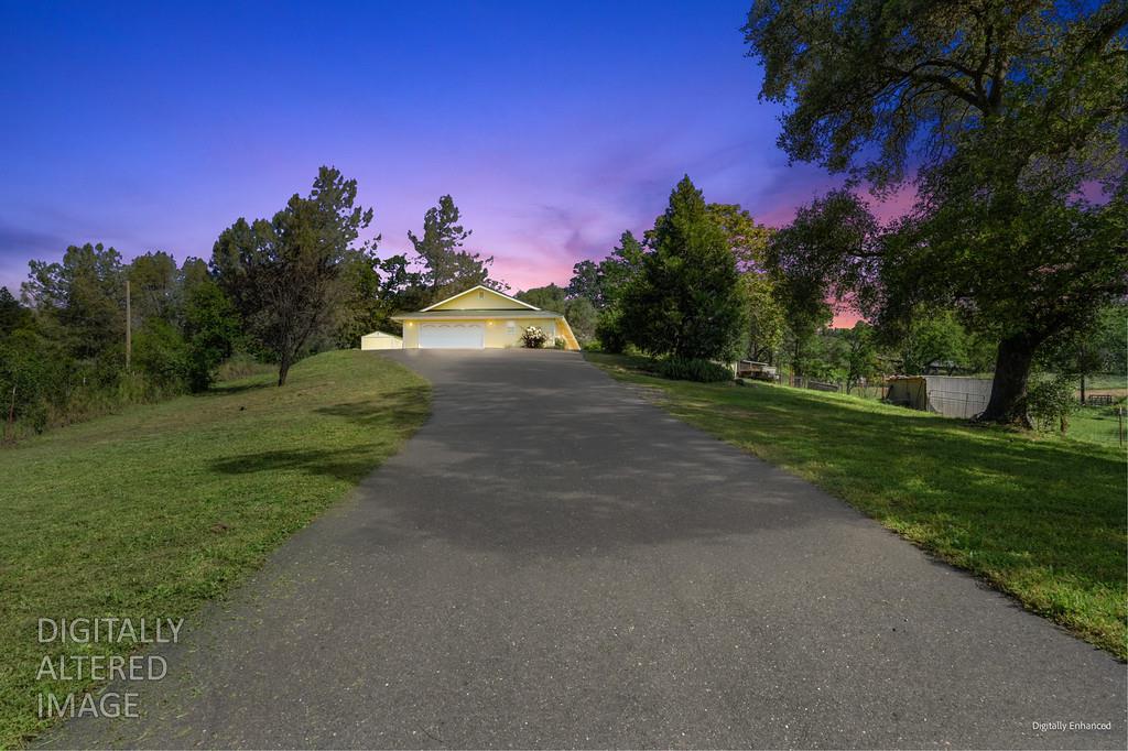 6181 Lambert Lane El Dorado, CA 95623 - Photo 2 of 80 a view of a street with a yard
