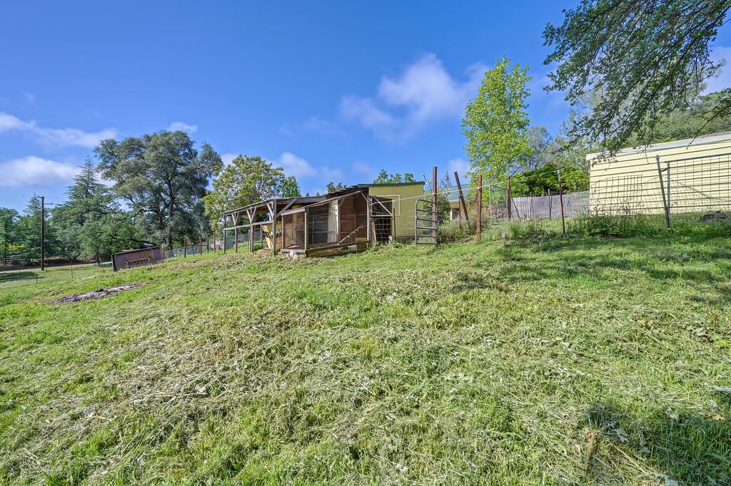 6181 Lambert Lane El Dorado, CA 95623 - Photo 66 of 80 view of yard with exterior structure and an outbuilding