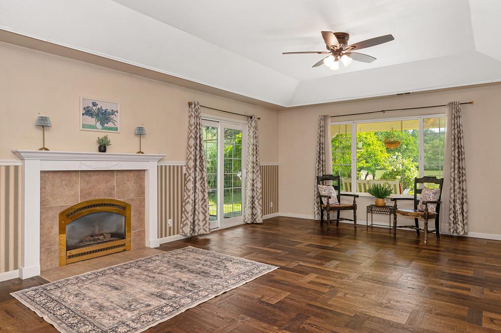 6181 Lambert Lane El Dorado, CA 95623 - Photo 75 of 80 a living room with furniture and a fireplace