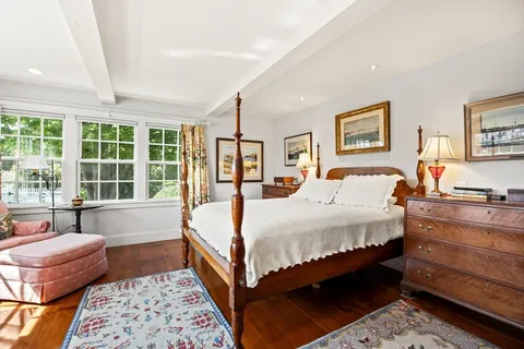 a bed room with a bed and a couch