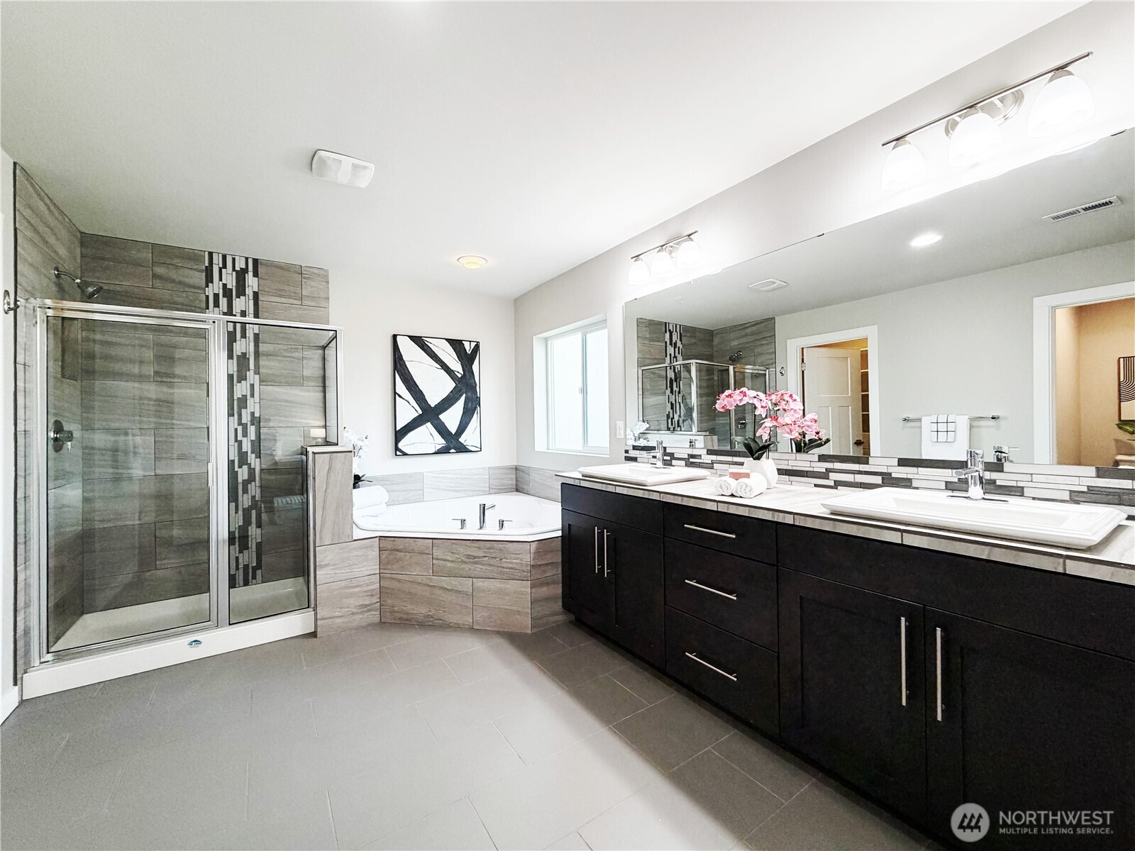 22724 41st Drive Southeast Bothell, WA 98021 - Photo 25 of 40 a bathroom with a tub sink shower and mirror