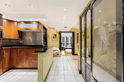 a bathroom with a mirror and a shower