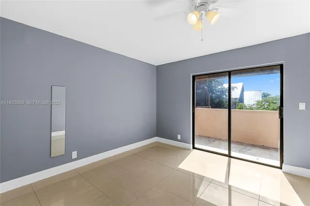 a view of an empty room with window