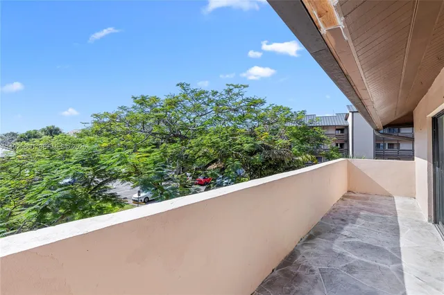 a view of a building from a balcony
