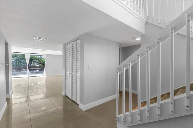 a view of an entryway with staircase