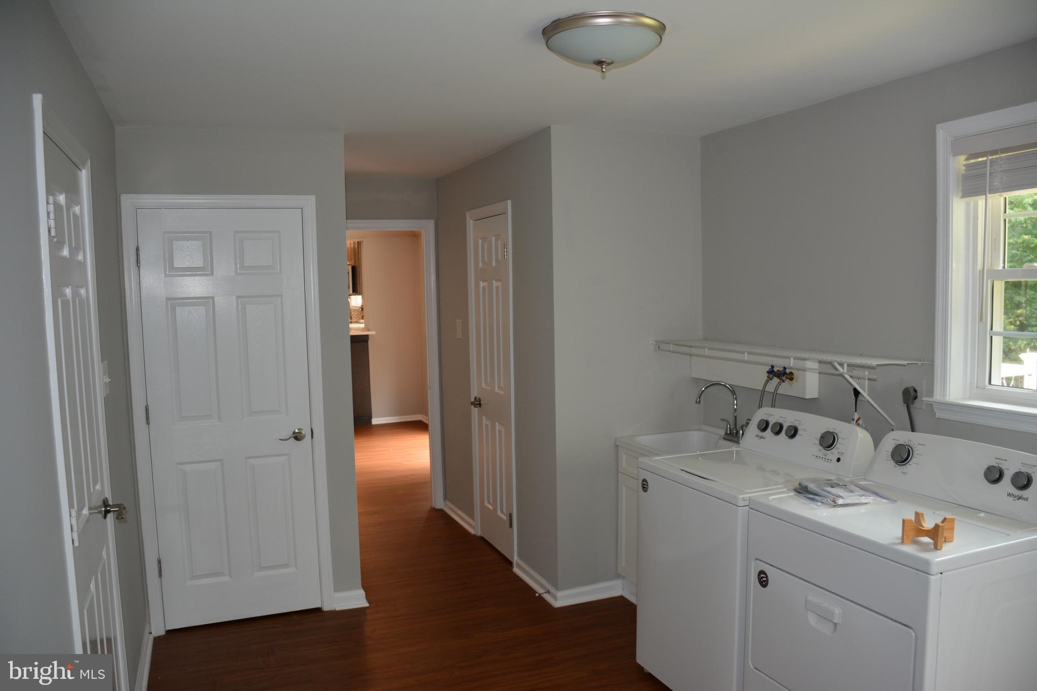 711 Brainerd Road Exton, PA 19341 - Photo 9 of 18 Large mud room / laundry room and half bath