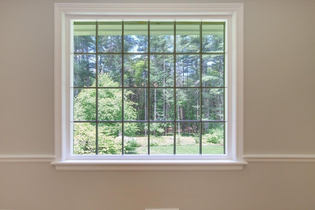 175 Powers Road Sudbury, MA 01776 - Photo 12 of 32 a view of a room that has a window and a lake view