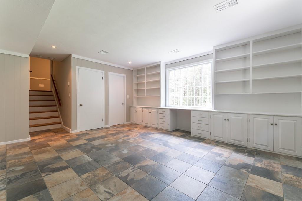 175 Powers Road Sudbury, MA 01776 - Photo 17 of 32 a view of an empty room with a window