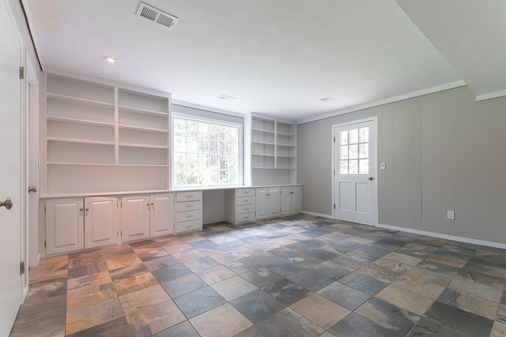 175 Powers Road Sudbury, MA 01776 - Photo 18 of 32 a view of an empty room with a window