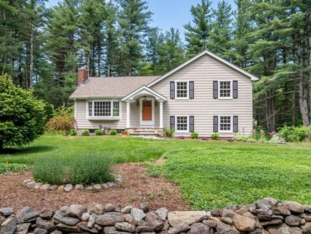 175 Powers Road Sudbury, MA 01776 - Photo 2 of 32 a view of a yard in front of house