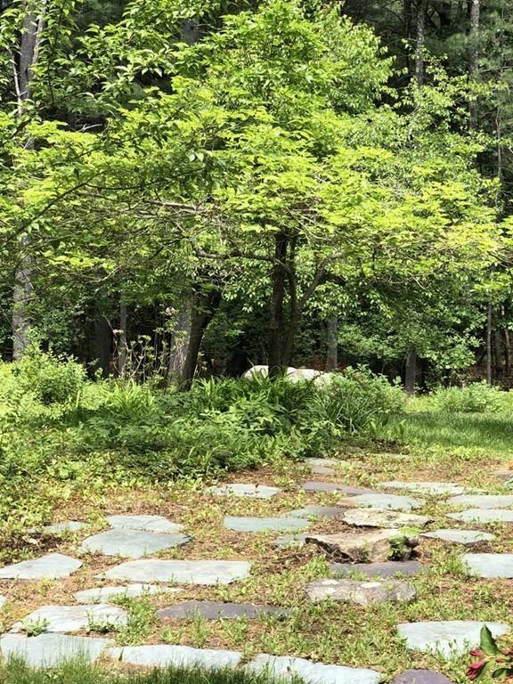175 Powers Road Sudbury, MA 01776 - Photo 29 of 32 a view of a yard with an outdoor space