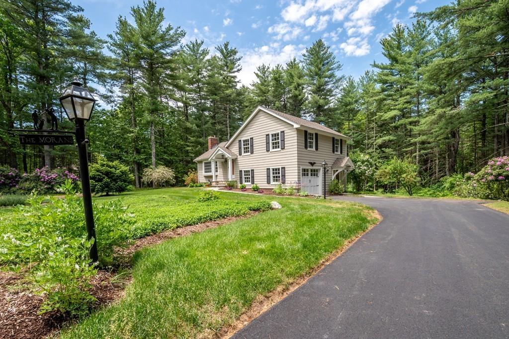 175 Powers Road Sudbury, MA 01776 - Photo 32 of 32 a view of a house with backyard and garden