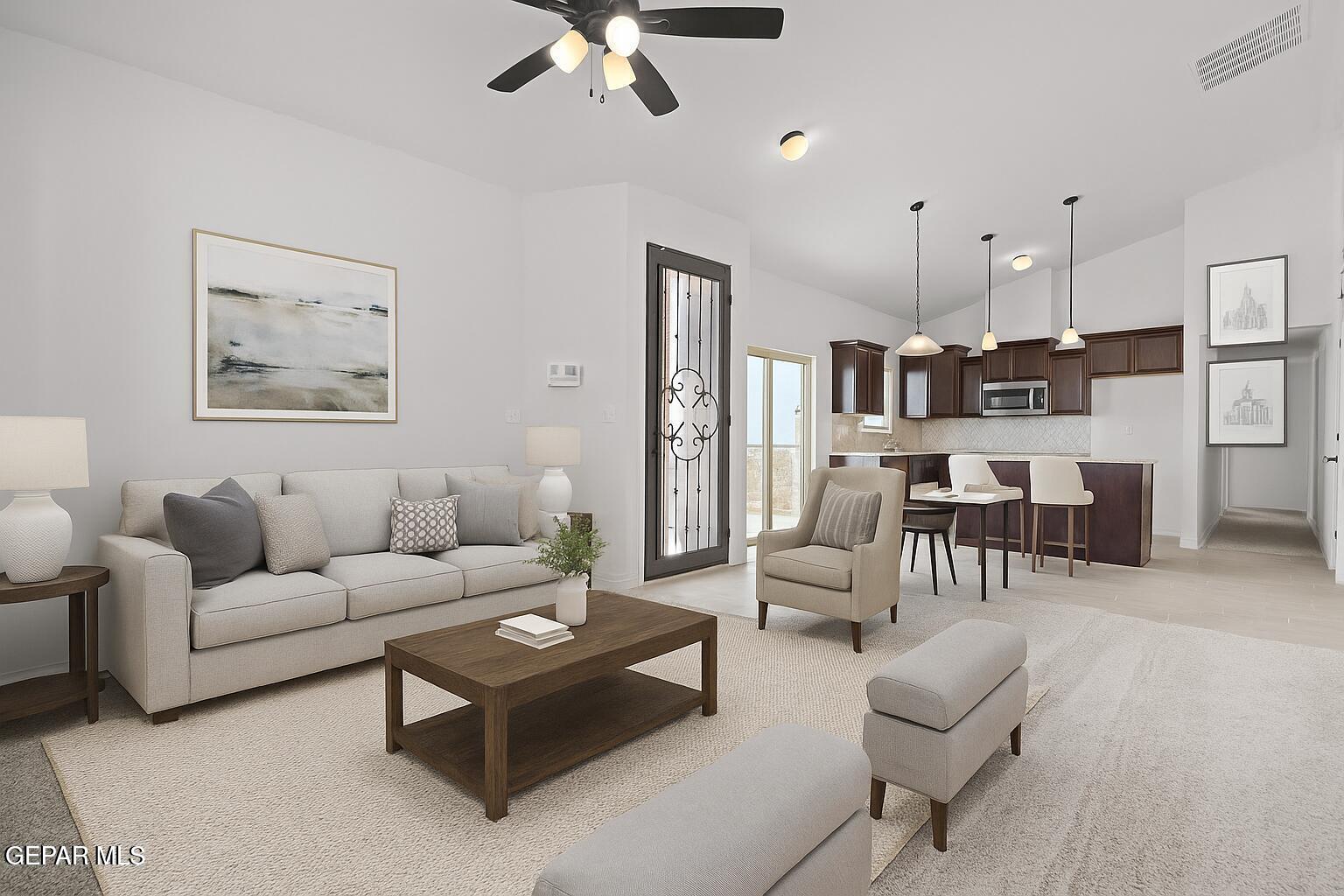 257 Farnborough Street El Paso, TX 79928 - Photo 13 of 34 a living room with furniture and a view of kitchen