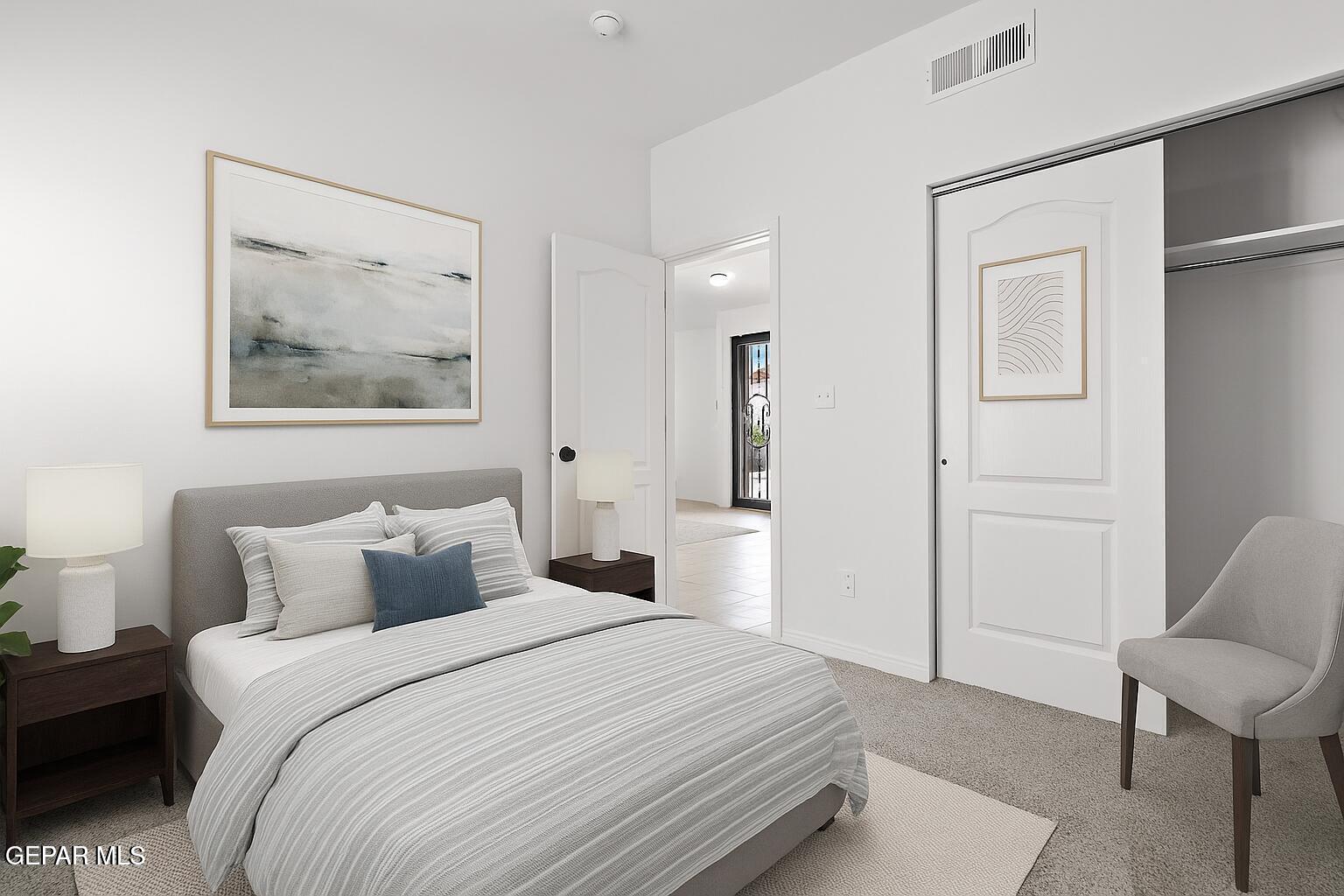 257 Farnborough Street El Paso, TX 79928 - Photo 17 of 34 a bedroom with a bed and a painting on the wall