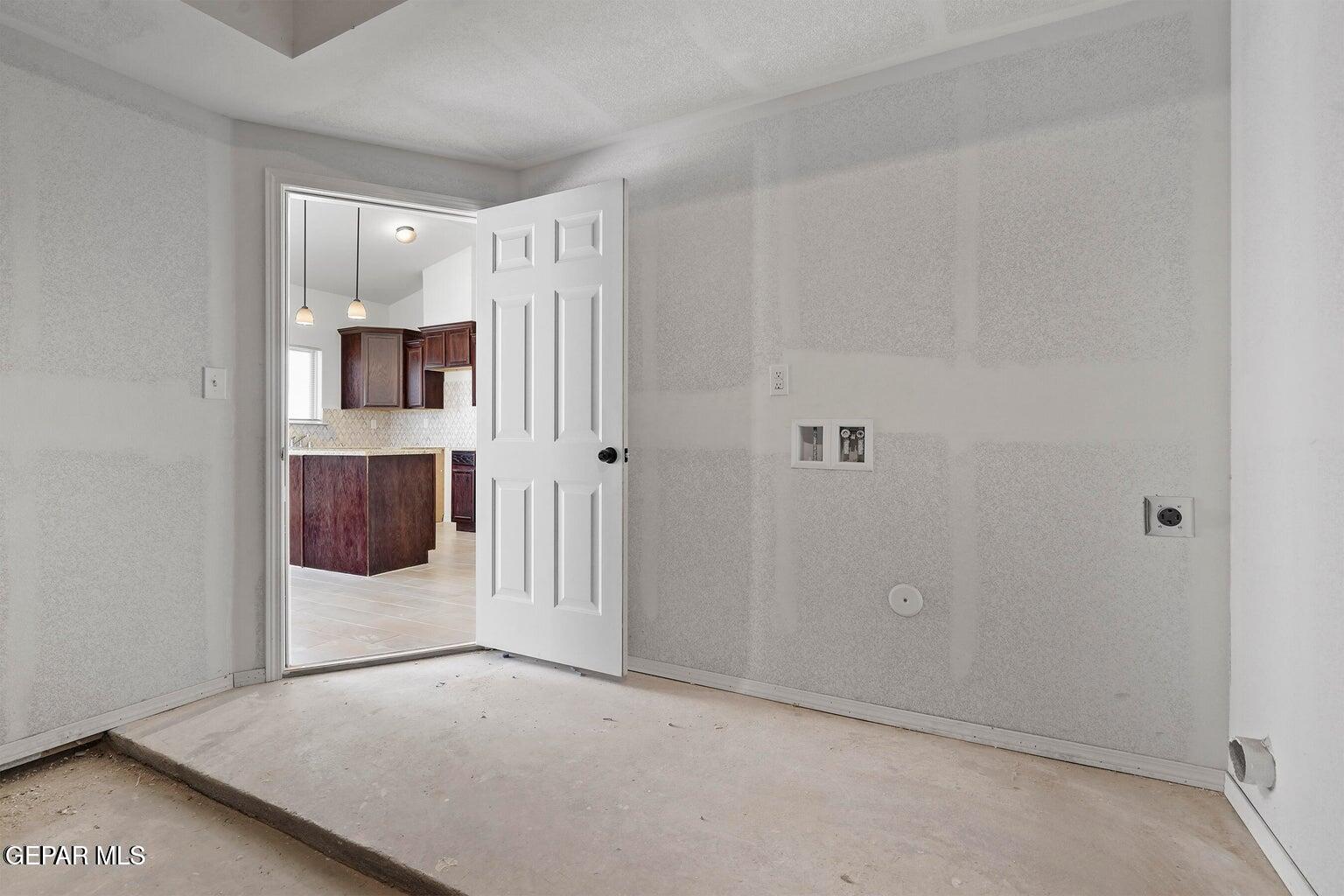 257 Farnborough Street El Paso, TX 79928 - Photo 20 of 34 a view of a room with wooden floor and cabinet