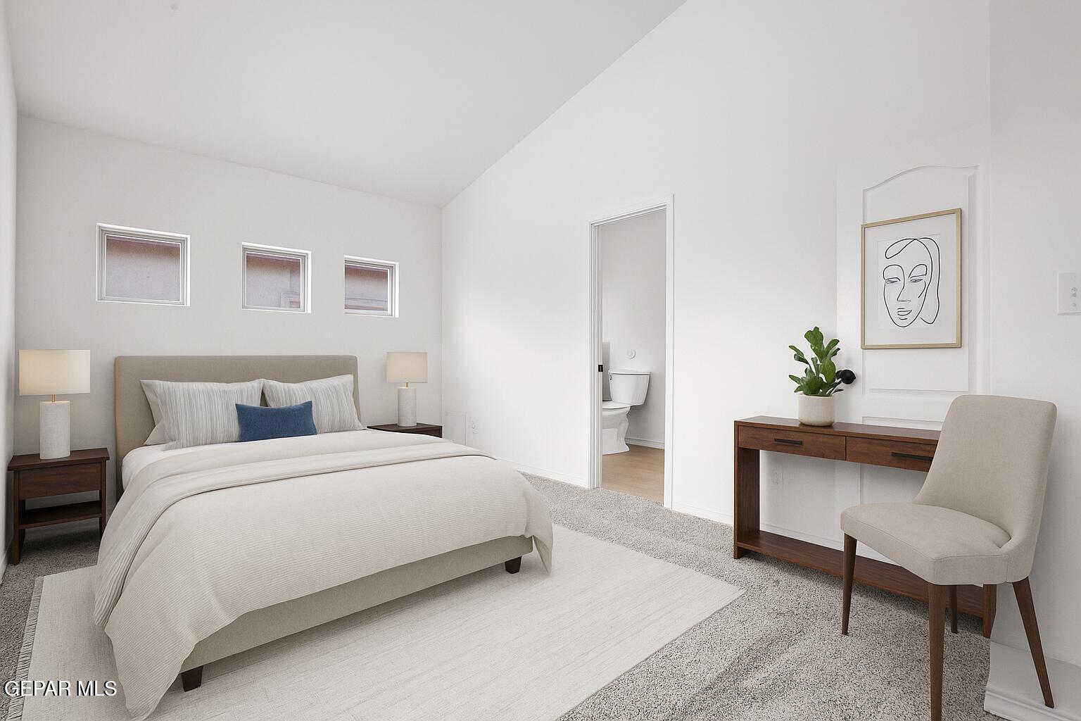 257 Farnborough Street El Paso, TX 79928 - Photo 29 of 34 a bedroom with a bed and a couch