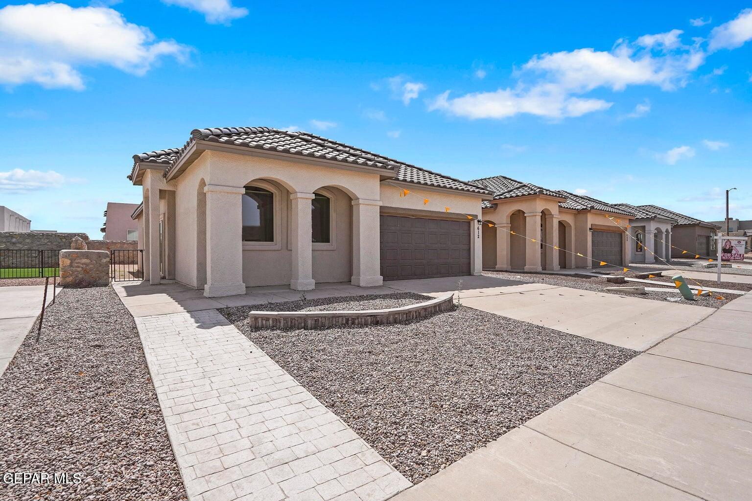 257 Farnborough Street El Paso, TX 79928 - Photo 4 of 34 a view of a house with a yard