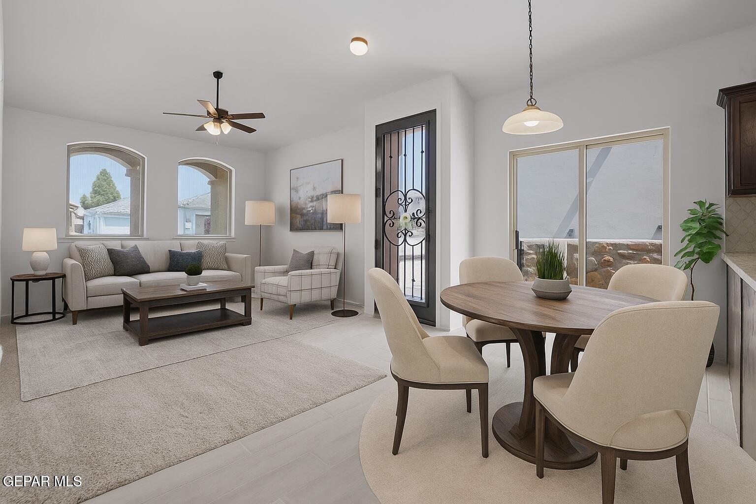 257 Farnborough Street El Paso, TX 79928 - Photo 8 of 34 a living room with furniture and a chandelier
