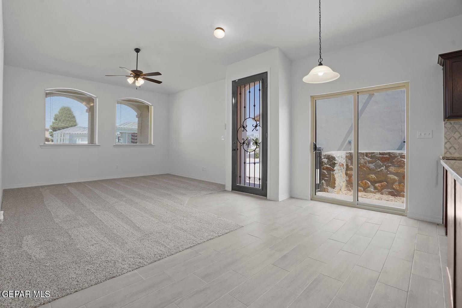 257 Farnborough Street El Paso, TX 79928 - Photo 9 of 34 a view of an empty room with a window