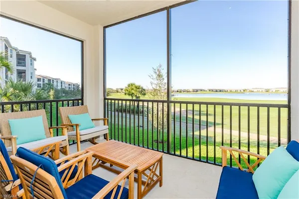 a view of a patio with wooden floor