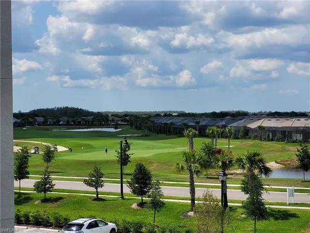 a view of a lake with a big yard