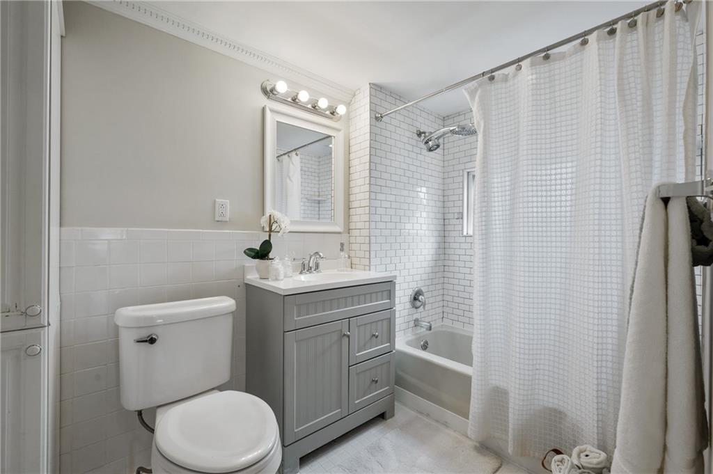 1908 Middle Street Pittsburgh, PA 15215 - Photo 18 of 30 The updated bath upstairs features a modern vanity, adequate lighting and linen cabinet (not pictured)