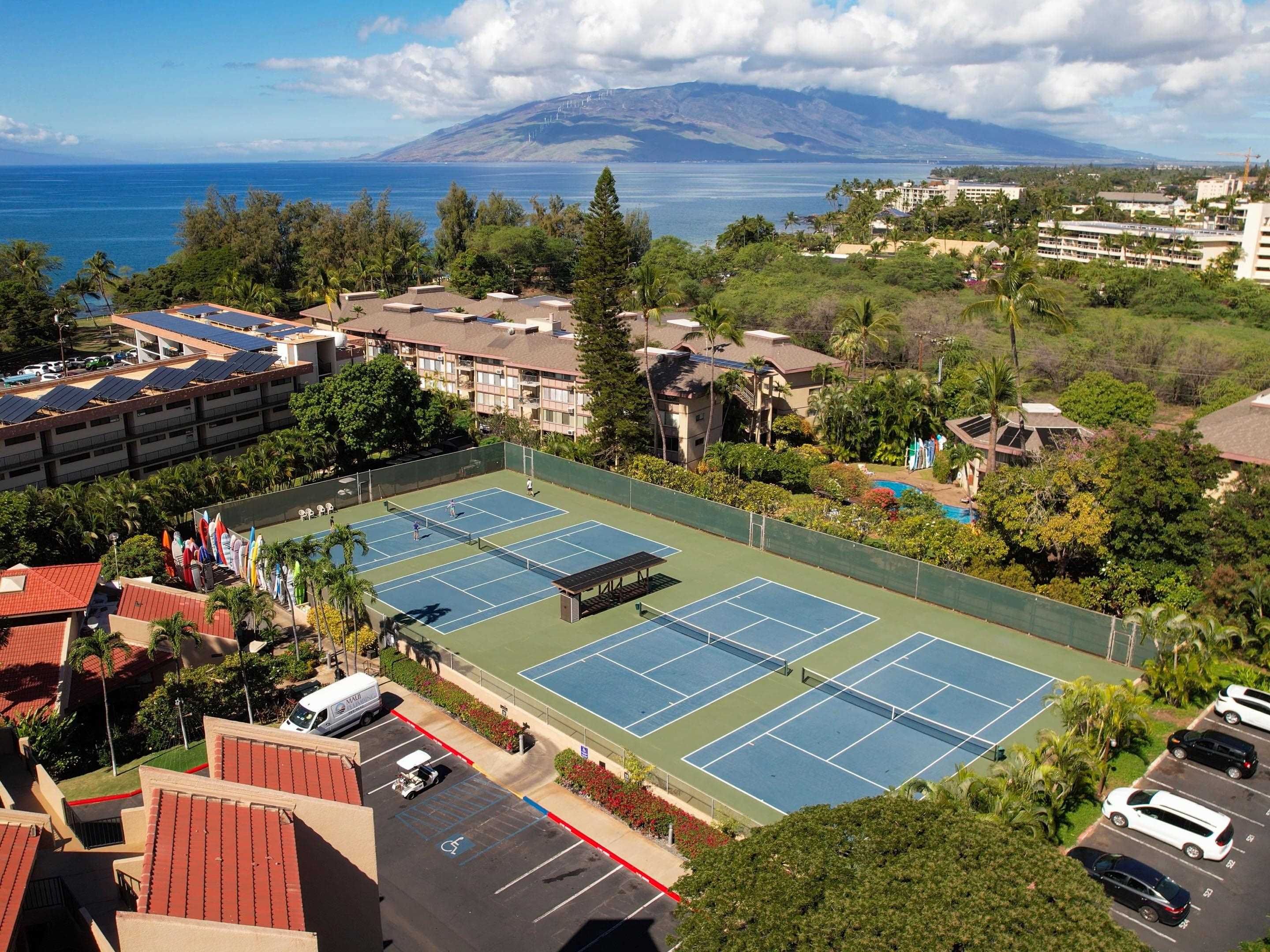 2695 South Kihei Road, Unit 7204 Kihei, HI 96753 - Photo 19 of 32 an aerial view of a tennis ground and a building