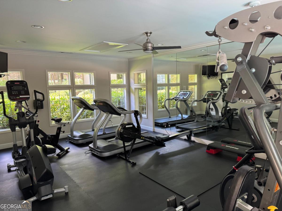 3047 Lenox Road Northeast, Unit 2107 Atlanta, GA 30324 - Photo 25 of 27 a view of a room with gym equipment