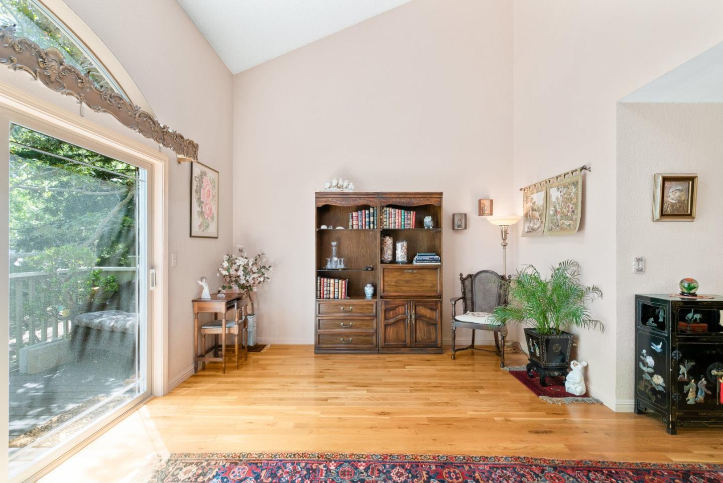 103 Stoney Creek Road Santa Cruz, CA 95060 - Photo 11 of 44 a view of a livingroom with furniture and a flat screen tv