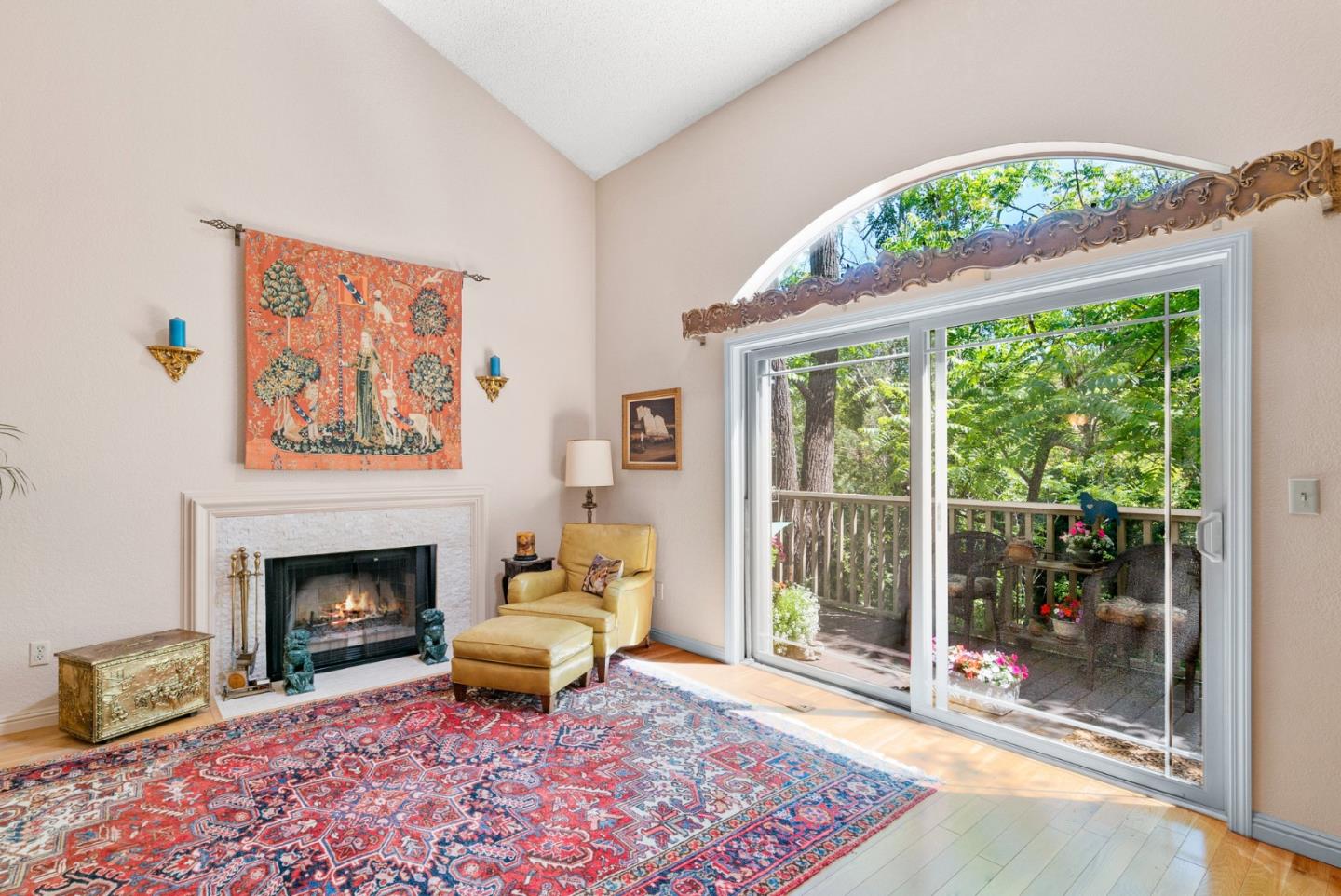 103 Stoney Creek Road Santa Cruz, CA 95060 - Photo 12 of 44 a living room with a fireplace and a floor to ceiling window