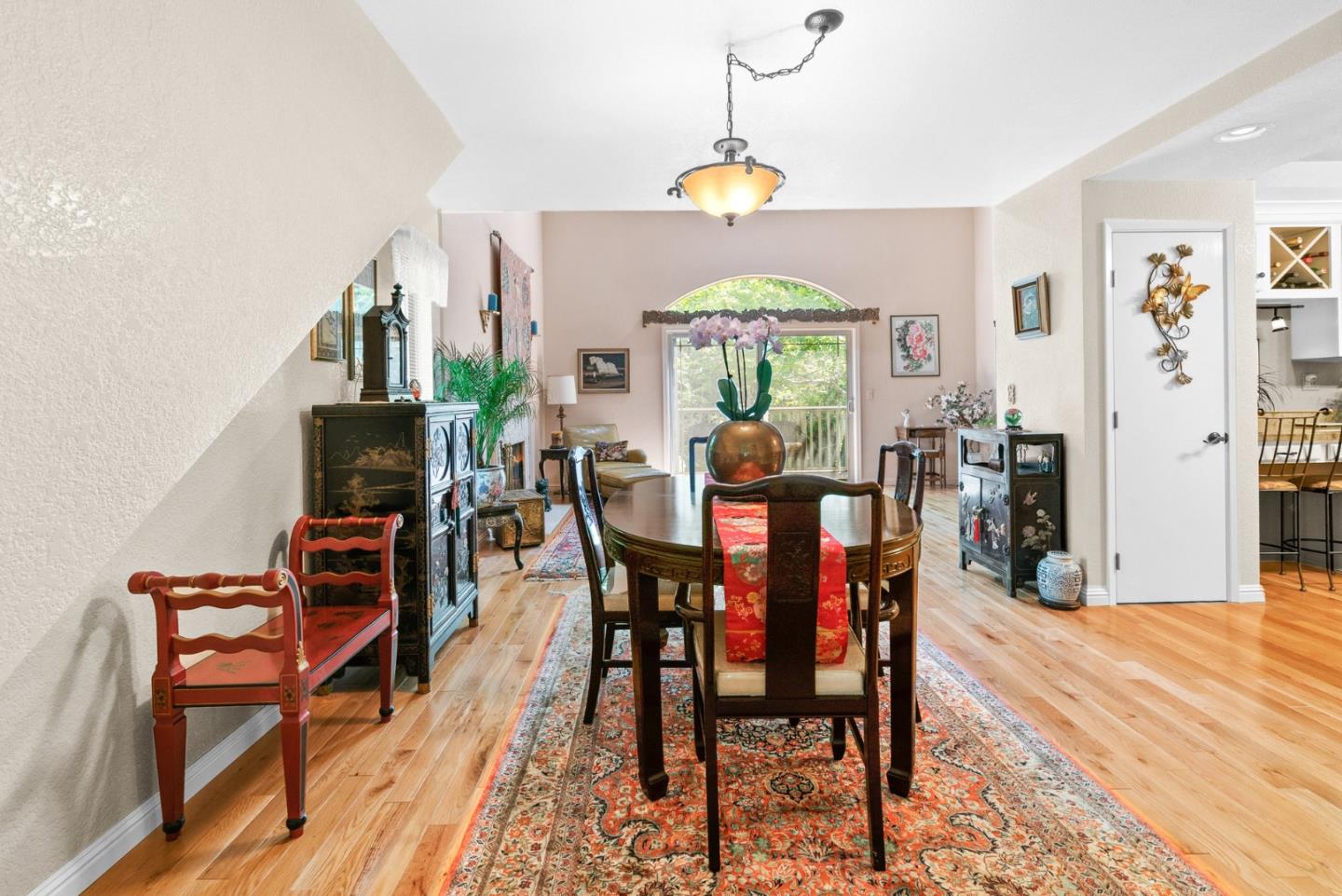 103 Stoney Creek Road Santa Cruz, CA 95060 - Photo 17 of 44 a view of a dining room with furniture and a chandelier